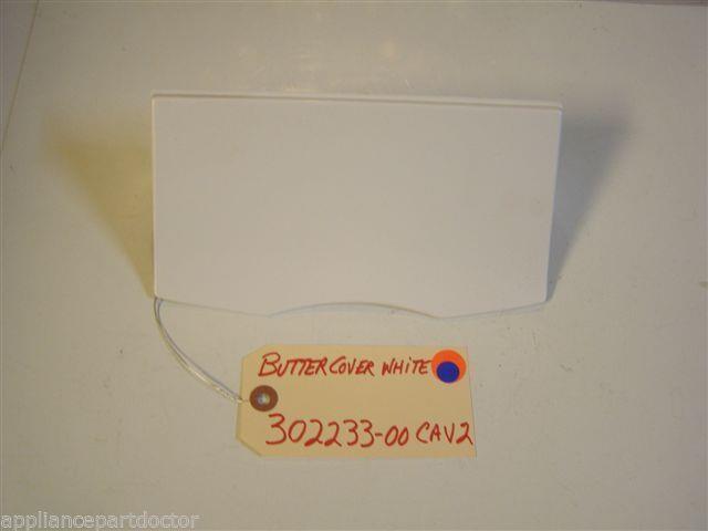 REFRIGERATOR 302233-00 CAV 2 BUTTER COVER WHITE USED PART REFRIGERATOR 302233-00 CAV 2 BUTTER COVER WHITE USED PART
